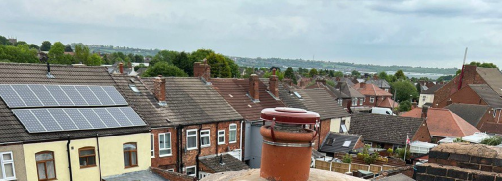This is a photo taken from a roof which is being repaired by TRP Roofing Kingswoo, it shows a street of houses, and their roofs